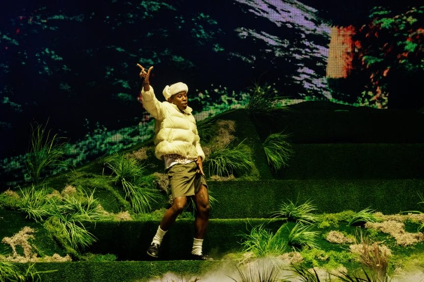 Tyler, The Creator performing on stage during his tour.