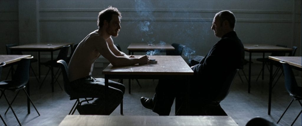 Michael Fassbender and Liam Cunningham in Hunger.