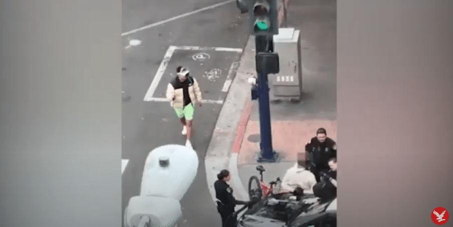 San Diego Police Department have a safety concern with obstructed vision on Apple Vsion Pro as an indvidual is crossing the road.