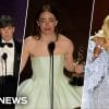 NBC News thumbnail with logo in left corner. Features Cillian Murphy in a black tux on the left, an emotional Emma Stone in a pale green dress in the center, and Da'Vine Joy Randolph in purple on the right.