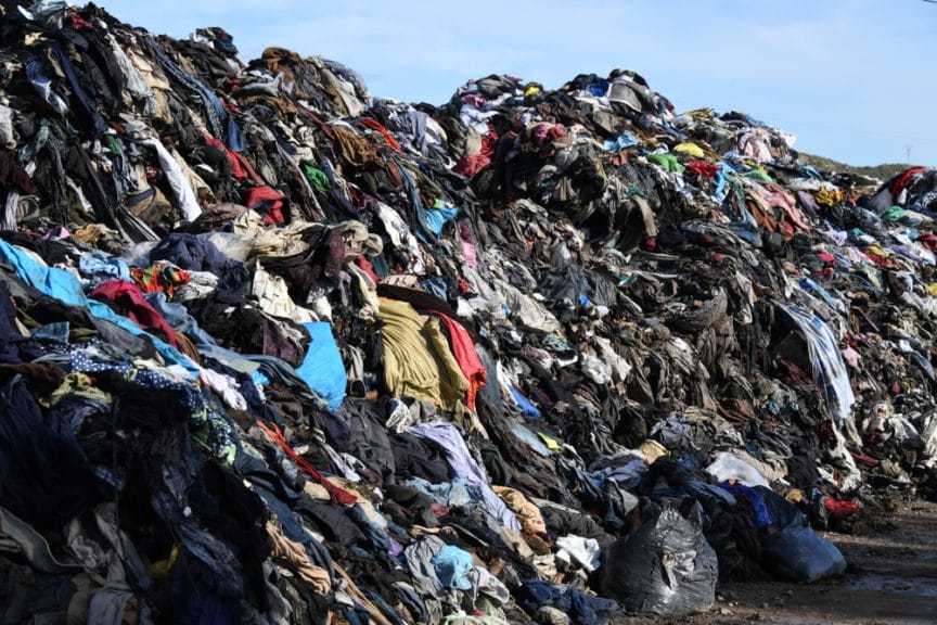 Pile of clothes polluting the environment