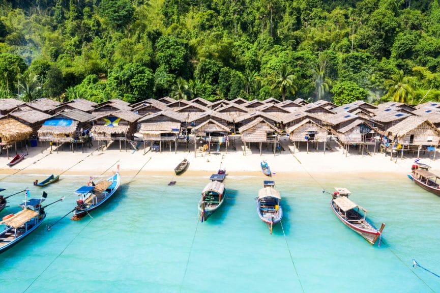 Moken tribe houses in front of the ocean