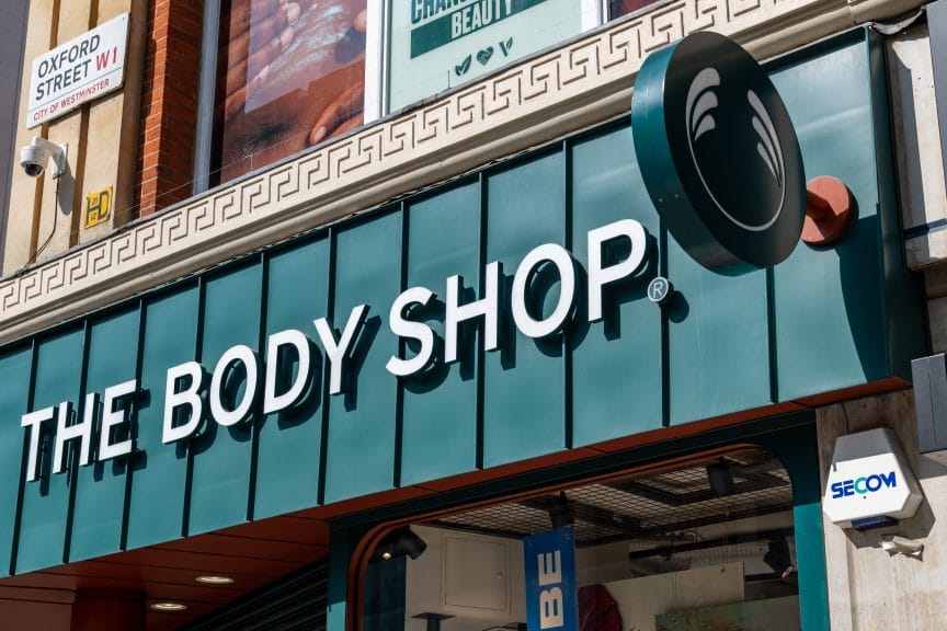 A green logo for The Body Shop on the front of a store.