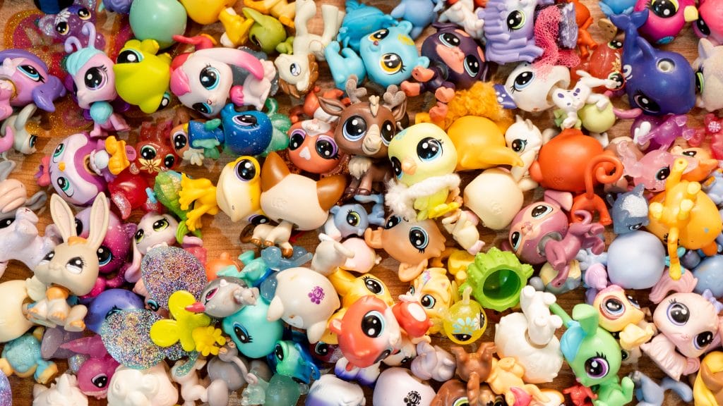 a group of Littlest Pet Shop toys
