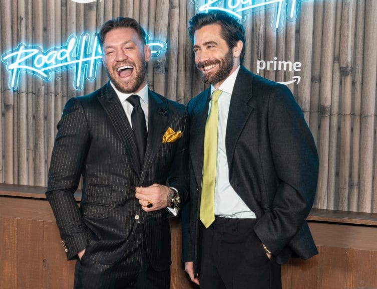 Conor McGregor (left) and Jake Gyllenhaal (right) trading smiles at Road House (2024) premiere. Credit: Shutterstock/lev radin