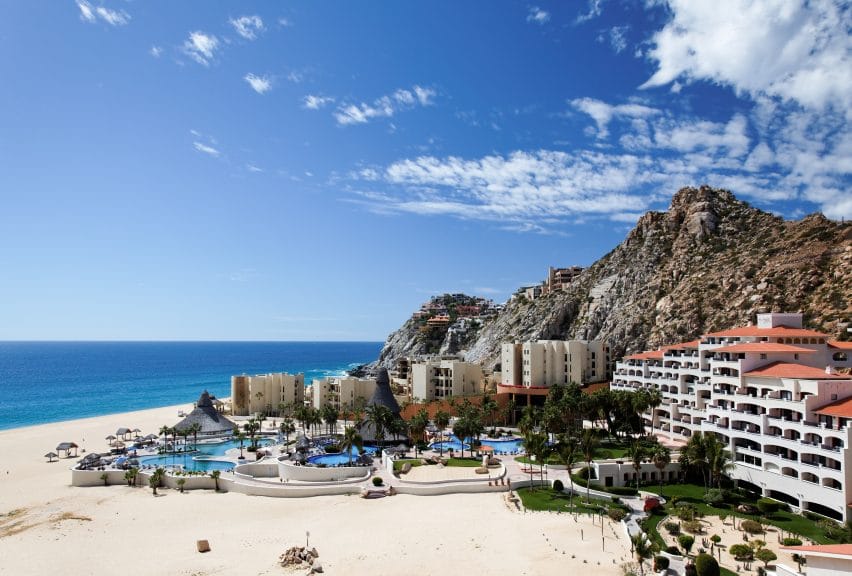 Aerial shot of Cabo San Lucas beach and hotels.