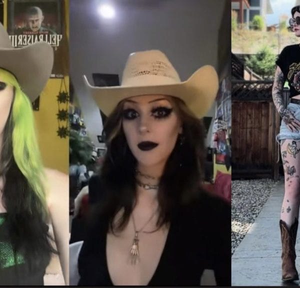 Goth girls in cowboy hats posing for a picture.