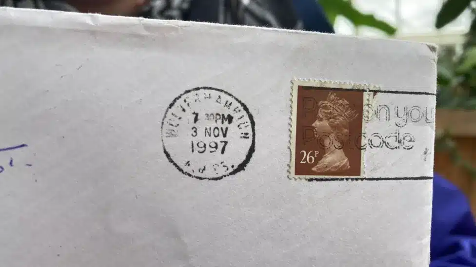 letter with stamp, year and place.