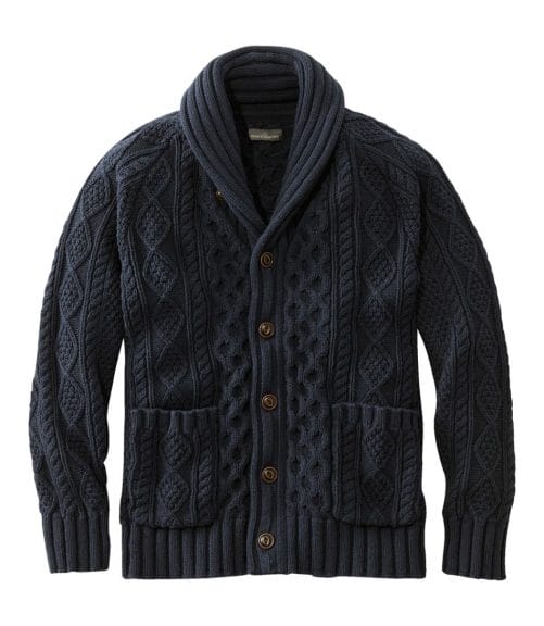 A dark blue and collared men's sweater. 