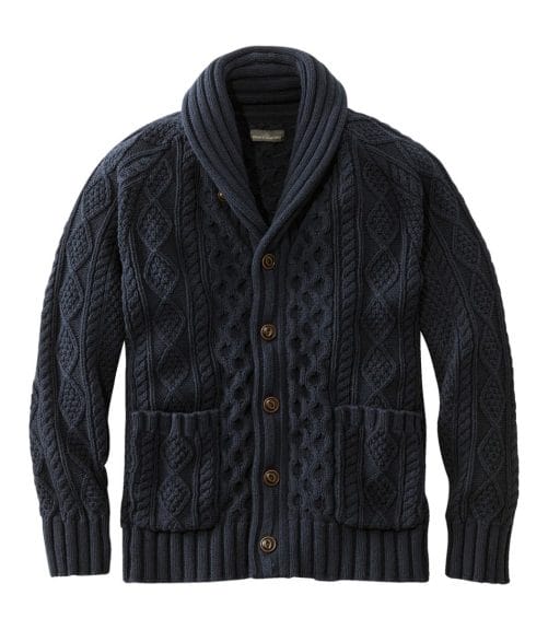 A dark blue and collared men's sweater.