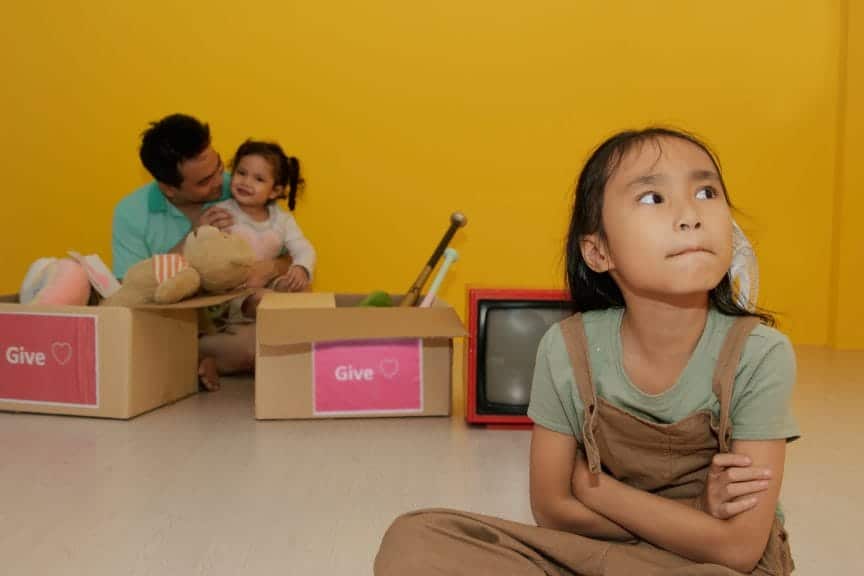 An eldest daughter feeling neglected because parents are focused on her siblings