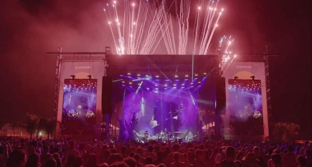 Band on stage with fireworks