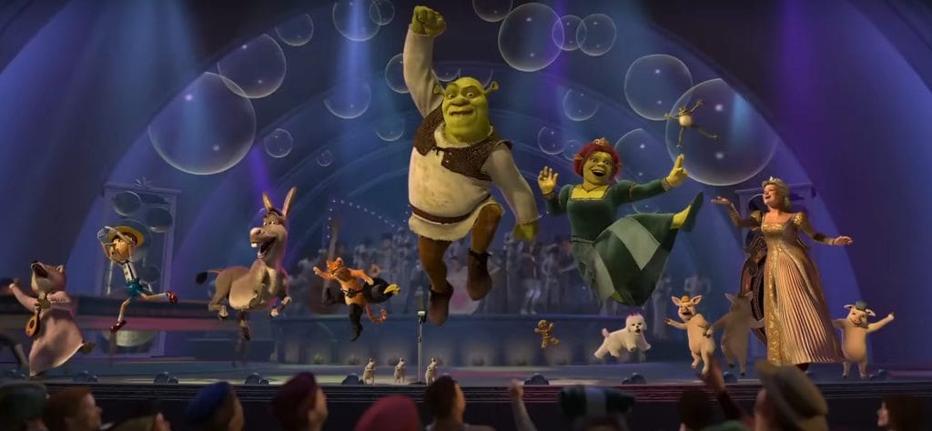 The main cast of Shrek 2 jumps up in the air triumphantly.