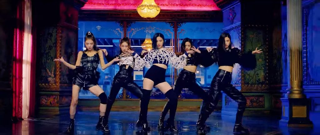 Still from ITZY's music video "WANNABE" in the middle of a dance break.
