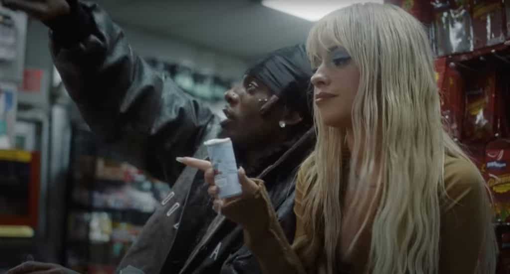 Still of Camila Cabello and Playboi Cart in their music video "I LUV IT"