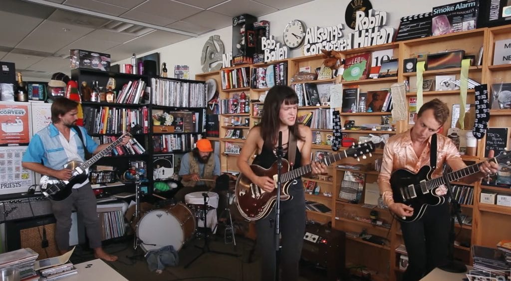 The band Big Thief performing on NPR's Tiny Desk Concert series. 