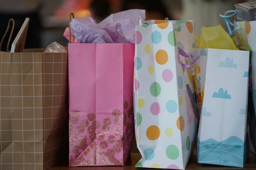 Shopping bags of different design and colours as part of consumer culture. 