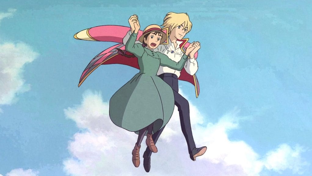 Howl guides a terrified Sophie as they fly through the air together.