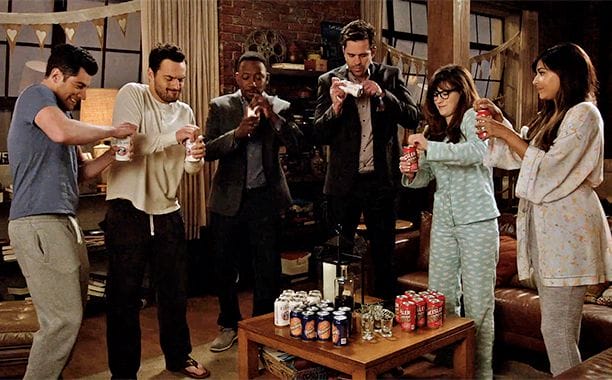 characters from New Girl open their drinks at the same time while playing True American