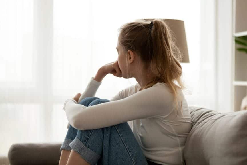 girl staring out window