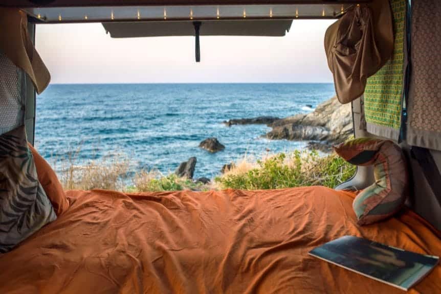 Beautiful Mediterranean views from inside a cosy bohemian van.