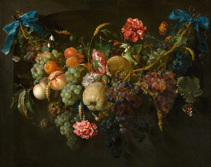 An image of flowers and fruit to represent The garden Met Gala theme.