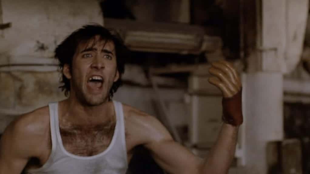 Nicolas Cage with a Wooden Hand in Moonstruck (1987).