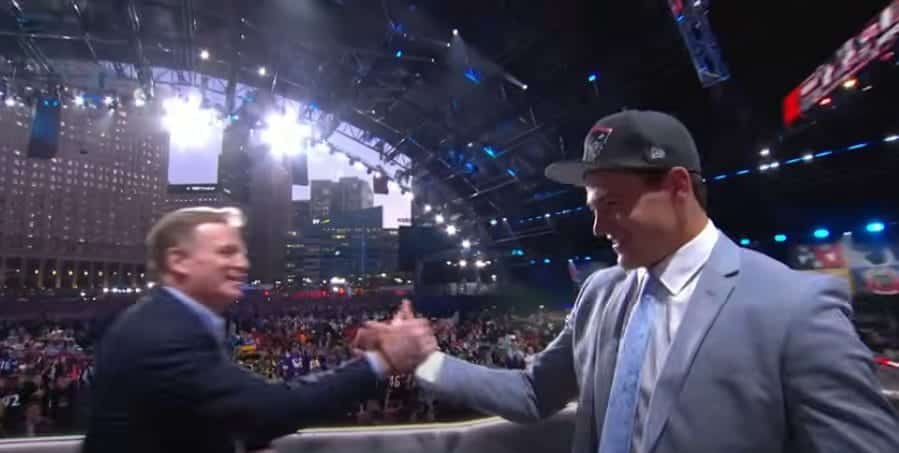 Drake Maye and Commissioner Rodger Goodell at the 2024 NFL Draft. Top 10 projections and picks.
