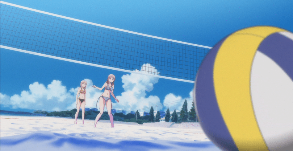 A volleyball lays in the sand while two teenage girls wearing swimsuits stand in the background behind a hanging net. Beautiful trees and clouds are further behind them.