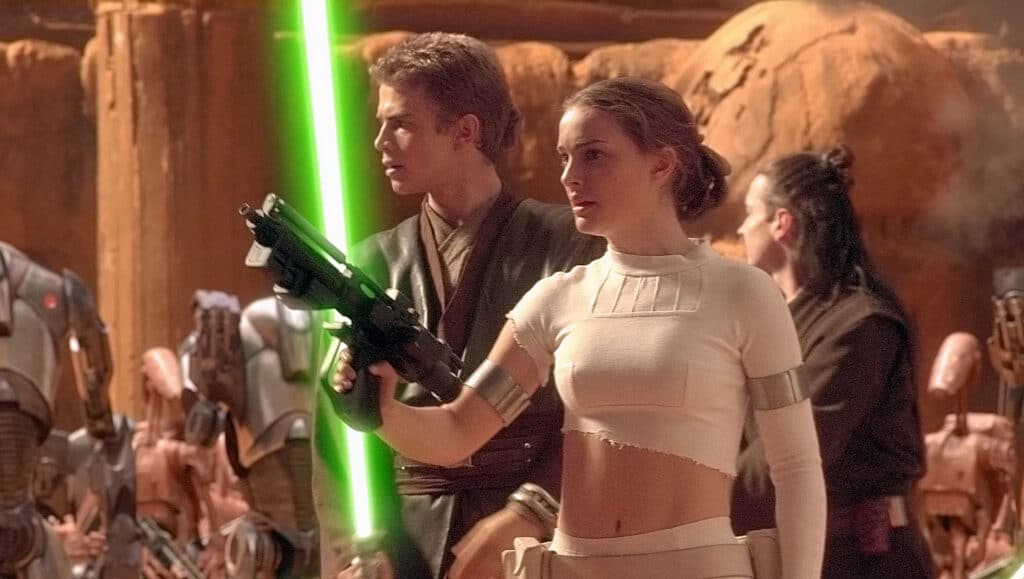 Anakin (Hayden Christensen) and Padmé (Natalie Portman) at the battlefield on Geonosis.