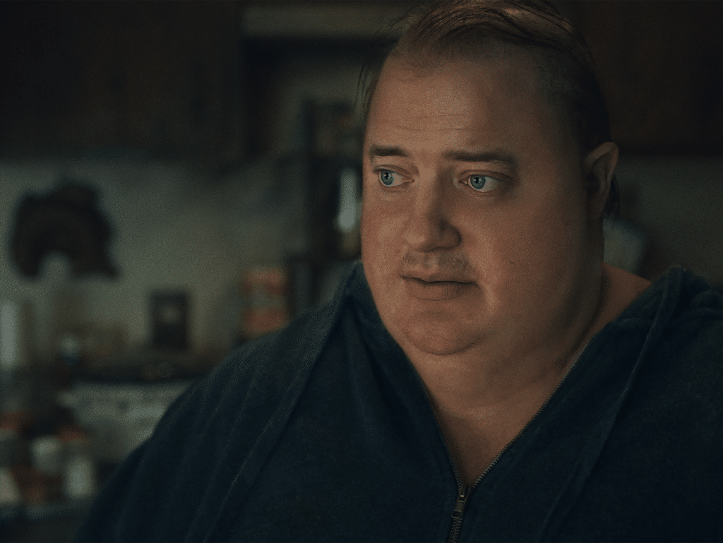 A man looks concerned and sickly.
