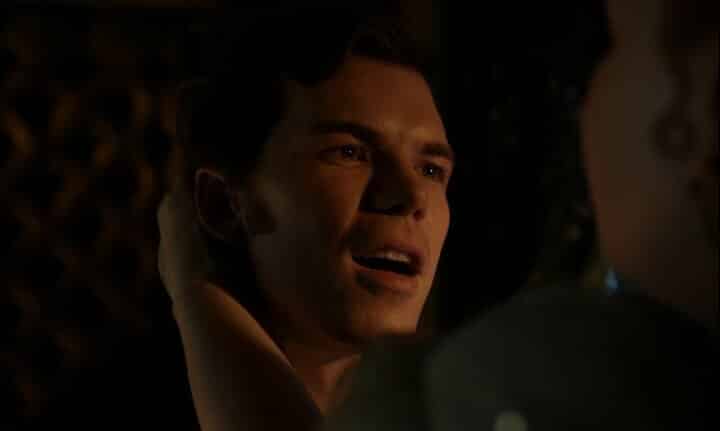 Colin looks longingly at Penelope Featherington as she runs her hands through his hair.