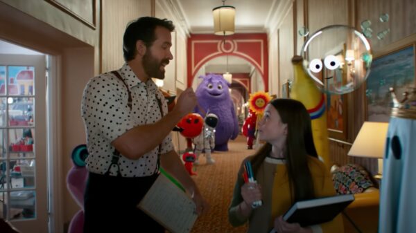 The IF characters walking through a hallway.