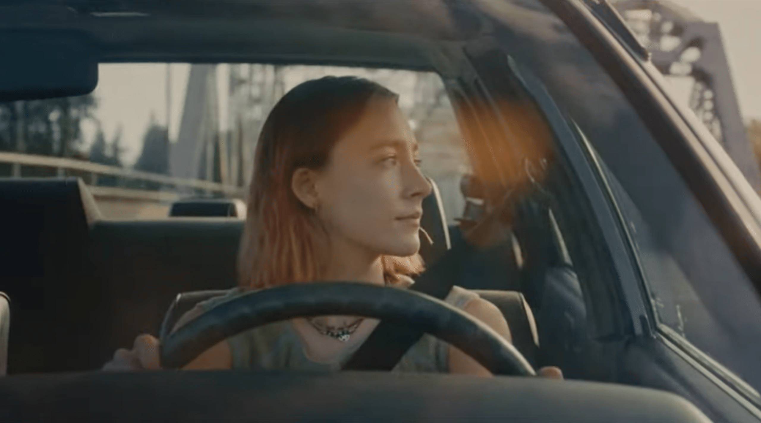 Saoirse Ronan looks emotional as she drives through Sacramento in the ending of "Lady Bird".