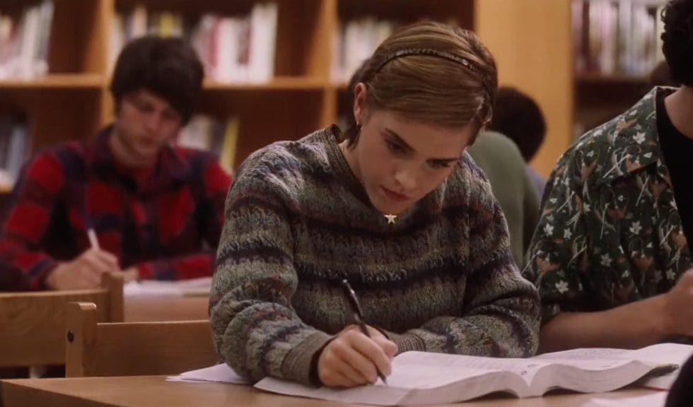 Emma Watson as Sam, in The Perks of Being a Wallflower studies in a library.