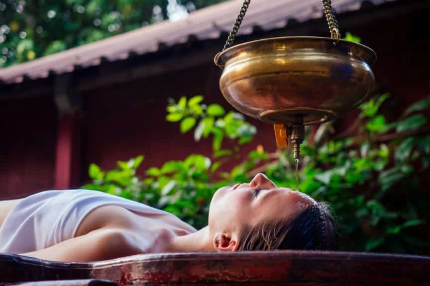 woman getting an ayurvedic healing massage