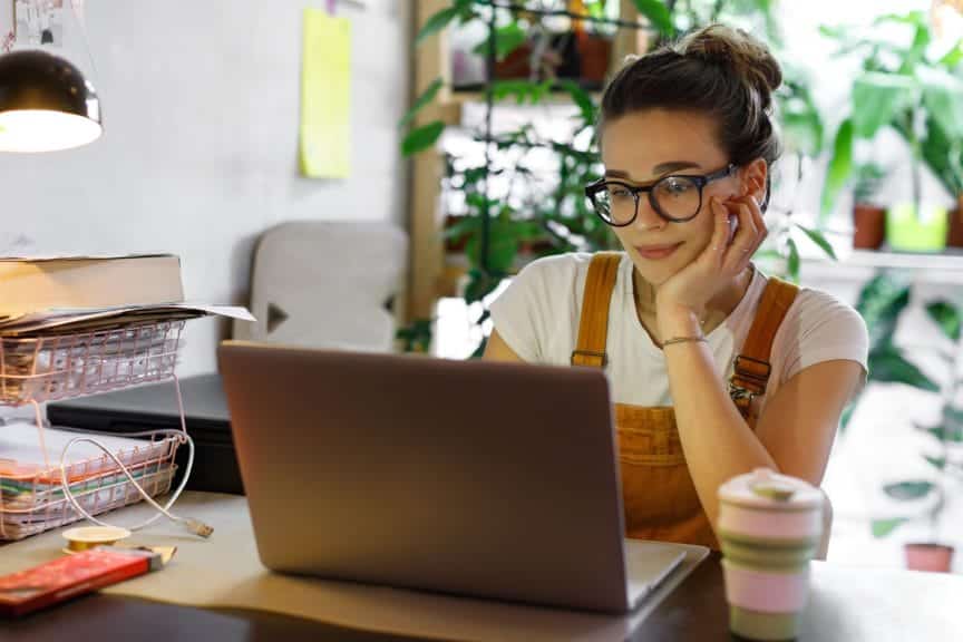 Woman at home working on laptop