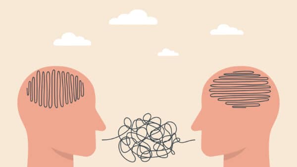 Heads talking with scribbled speech