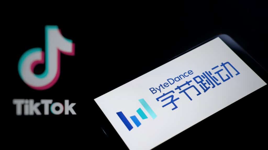 TikTok logo next to ByteDance logo open on a phone with a black background.