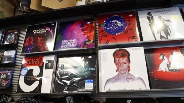 Vintage record store displays records by the Cure and David Bowie, both of whom fall under the genre of "manipulator music"