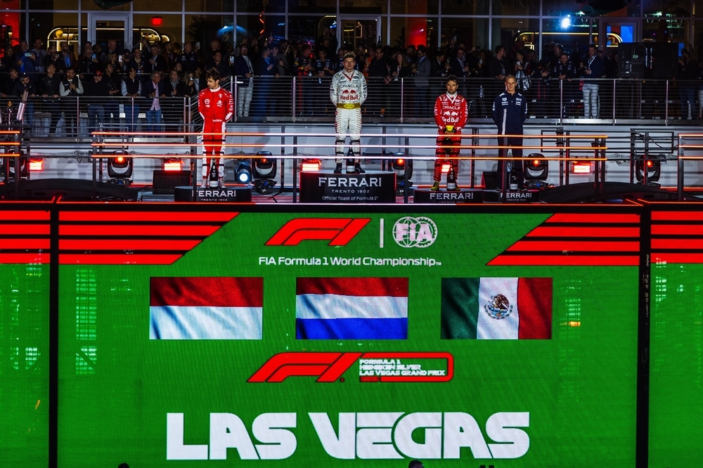 Max Verstappen, Charles Leclerc, and Sergio Perez on the podium
