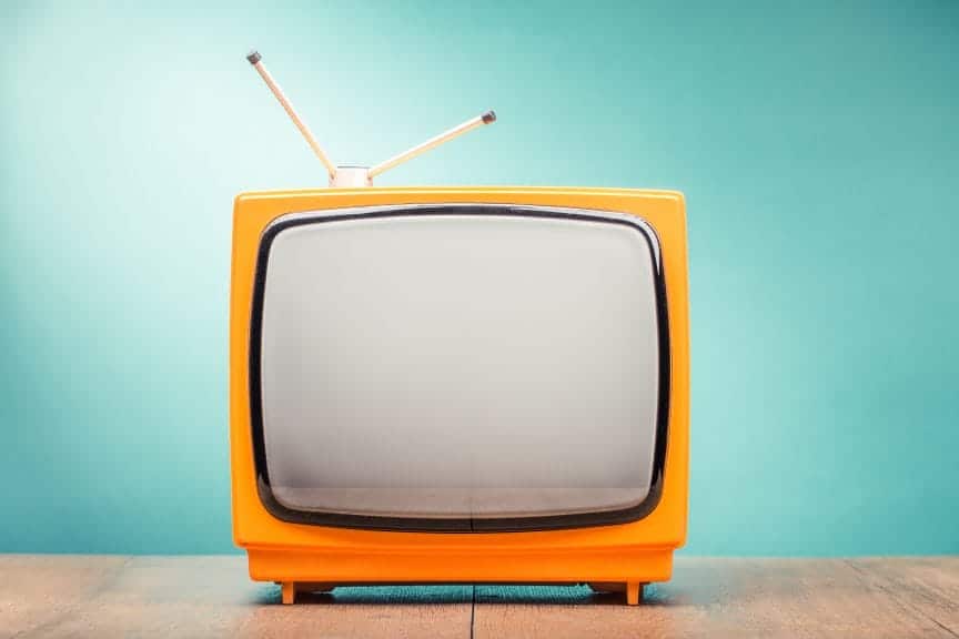 Retro orange TV with a static screen.
