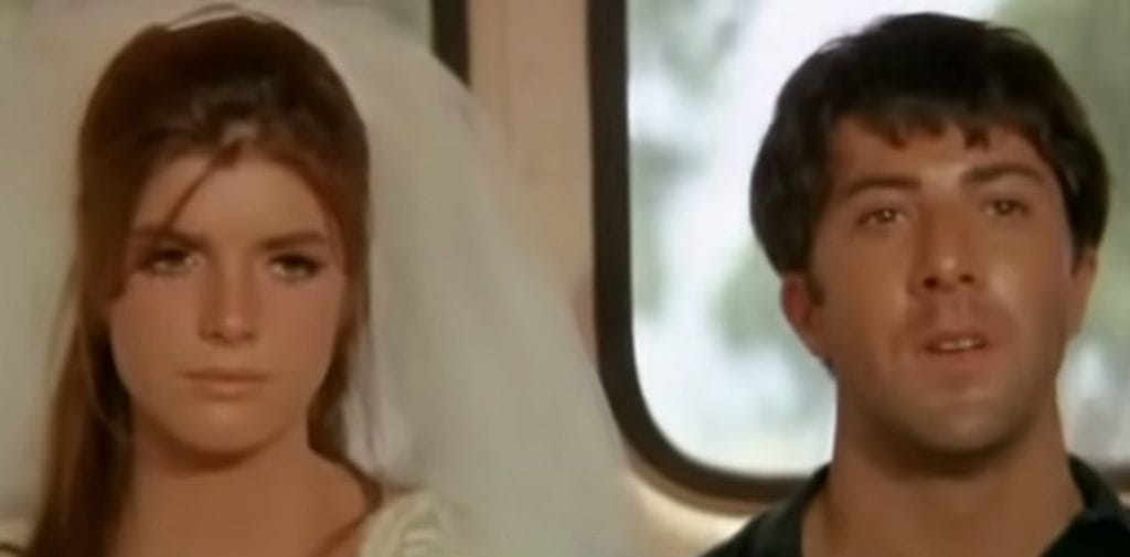 The final shot of the movie, The Graduate, where Ben and Elaine ride away on a bus. She is in a wedding dress. They both look shocked for the future.