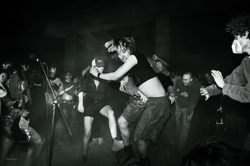 Dancers in the mosh pit at a punk show.