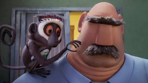 Flint's father looking forward with Steve the monkey on his shoulder