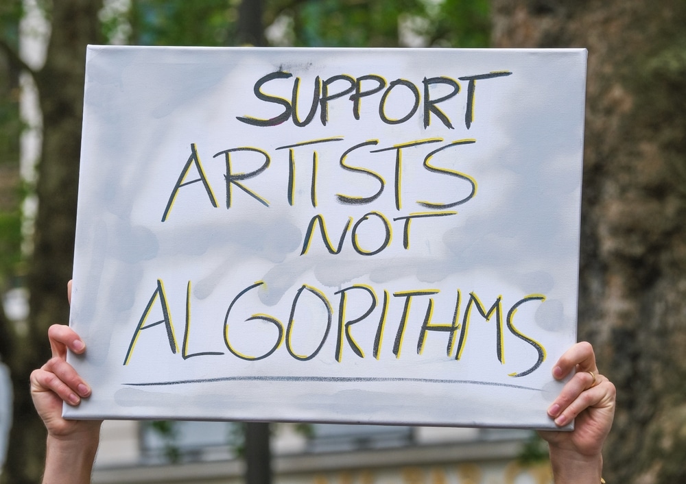 A sign reading 'Support Artists Not Algorithms'