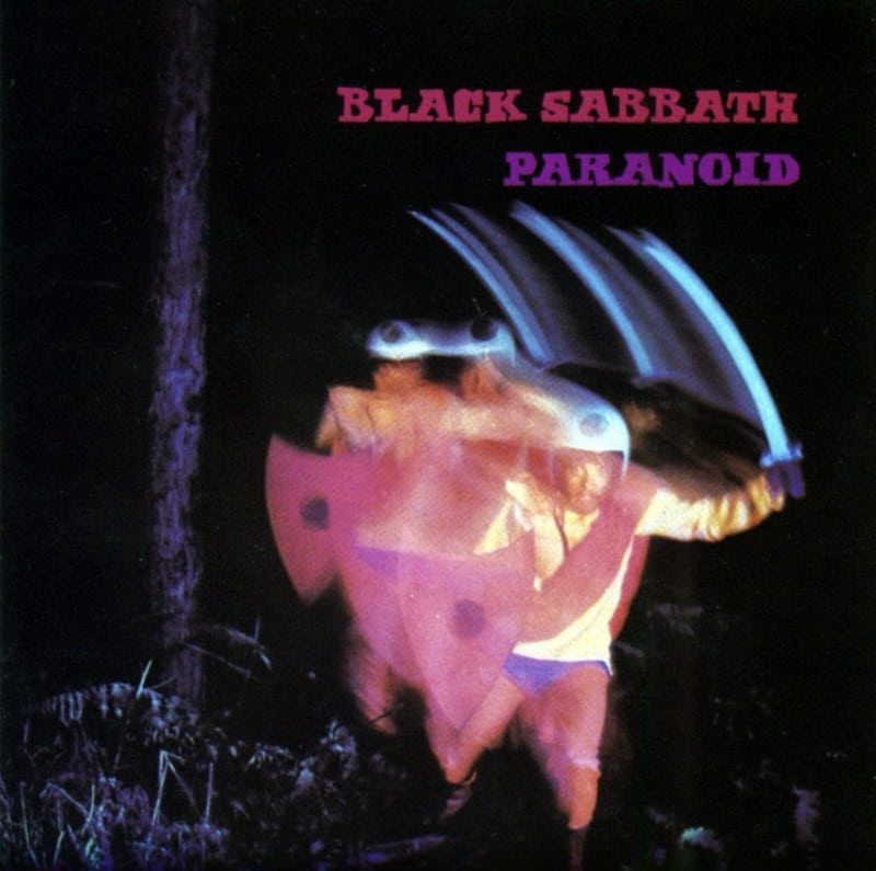 Album art featuring a blurred image a man in a helmet holding a sword.