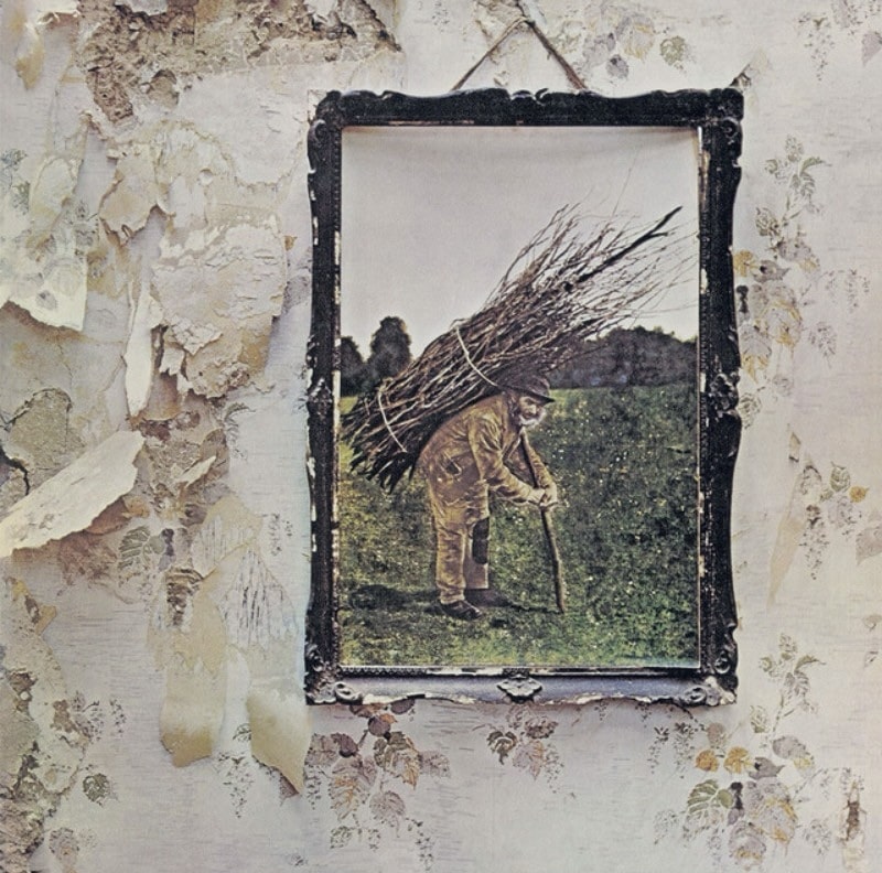 Album art of a painting of an old man carrying a bundle of sticks.