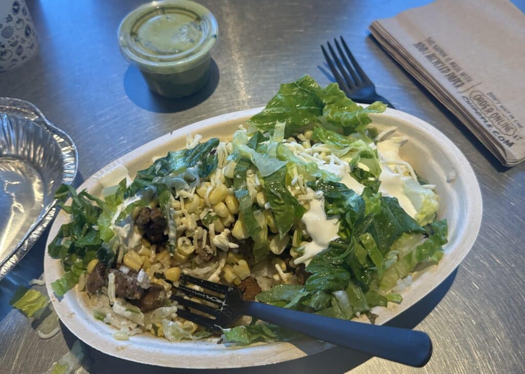 A large Chipotle bowl on a table