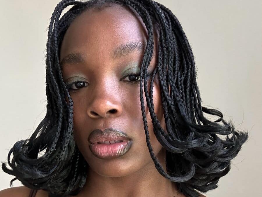 Woman photographed with a braided bob.